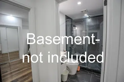 a room with a glass door with the words assessment not included at Perfect Group Getaway Large House with Style in Bolton