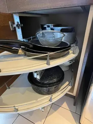 a shelf with plates and bowls on it at 2 Bed Apartment in DT Toronto with Free Parking in Toronto