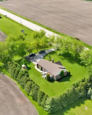 an overhead view of a large house on a lawn at Paradise Haven in Arthur