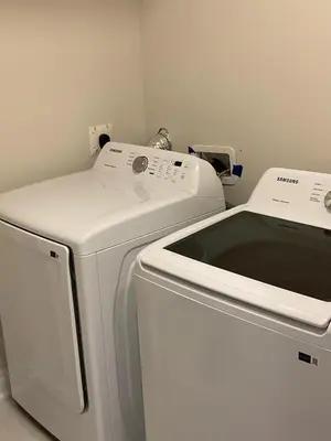 a white washer and dryer in a room at 3bed Bright Oakville Townhome with balcony, office in Oakville