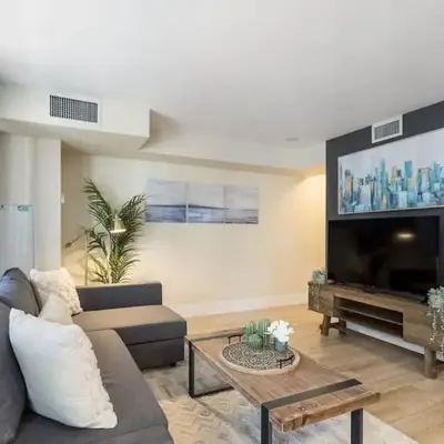 Modern 1BR Retreat with Balcony & Parking