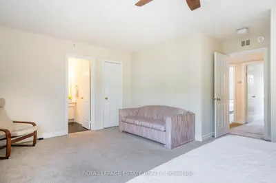 a living room with a couch and a chair at Mountain Home in the Heart of Blue Mountain Village in Blue Mountains