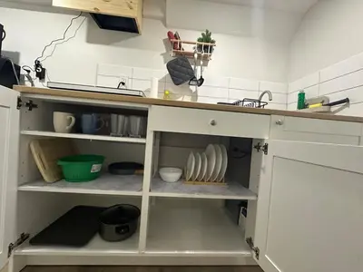 a kitchen with a sink and a counter top at Cozy Basement Studio with Private Bathroom and Kitchen in Vaughan