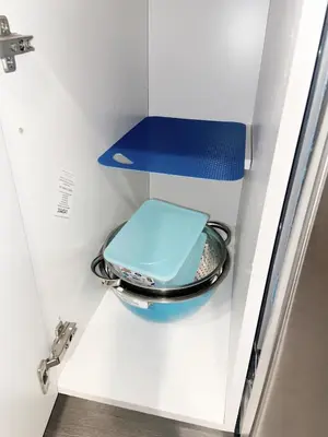 a blue suitcase is sitting in a drawer at ClassicPavillion INN in Bowmanville