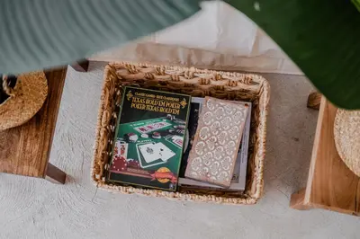 two books in a wicker basket on a table at 'MoonBeam' Boho-Luxe Glamping Dome at Marmora Retreat in Marmora