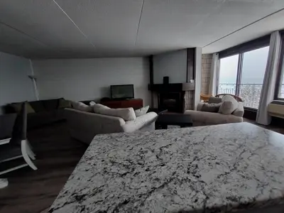 a large living room with couches and a table at Royal Harbour Resort in Thornbury