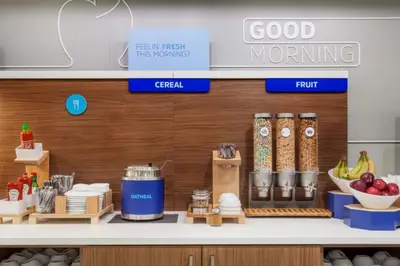 a store with a counter with food on it at Holiday Inn Express & Suites - Belleville by IHG in Belleville