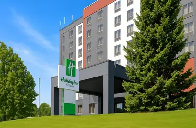 a rendering of the front of a hotel at Holiday Inn & Suites Mississauga West - Meadowvale by IHG in Mississauga