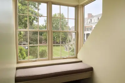a window seat in a room with a large window at Spencer Hotel & Conference Centre in London
