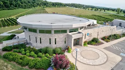 an aerial view of a large building with a garden at Residence & Conference Centre - Niagara-on-the-Lake in Niagara on the Lake