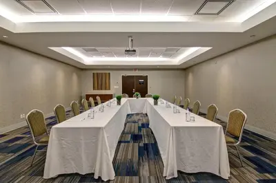 a conference room with a long table and chairs at Holiday Inn Express Hotel & Suites Toronto - Markham by IHG in Richmond Hill