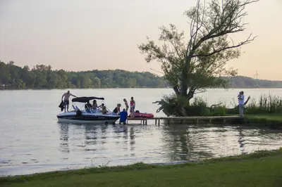 a group of people on a boat on a lake at Riverview Motel in Dunnville