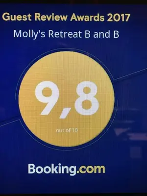 a sign with the number on it at Molly's Retreat B and B in Orangeville