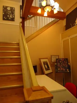 a staircase in a home with a stair case at The Rex Hotel Jazz & Blues Bar in Toronto