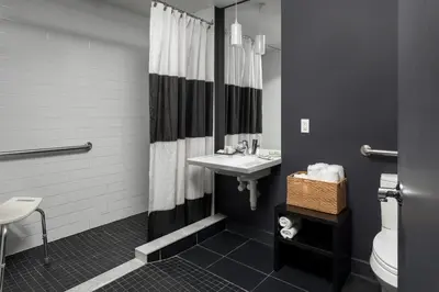 a bathroom with a sink and a toilet at Hotel Metro in London