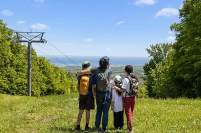 a group of people standing on a hill at The Westin Trillium House, Blue Mountain in Blue Mountains