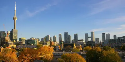 a view of a city skyline with the cn tower at The Alexandra Hotel in Toronto