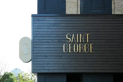 a sign on the side of a building that reads saint george at Kimpton Saint George Hotel by IHG in Toronto