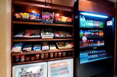 a refrigerator filled with lots of food and drinks at Residence Inn by Marriott Mississauga-Airport Corporate Centre West in Mississauga