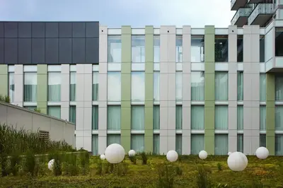 a building with white balls in front of it at Toronto Marriott Markham in Markham