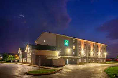 a building with a sign on the side of it at Quality Inn & Suites in Grimsby