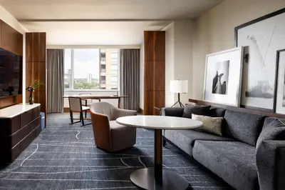 a living room with a couch and a table at Park Hyatt Toronto in Toronto