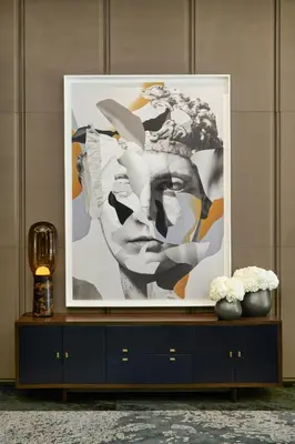 a picture of a woman on a dresser in a room at The Hazelton Hotel in Toronto