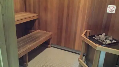 a small room with a bench and a box of rocks at 2 Bedroom 1 Bathroom Prime Location in Mississauga in Mississauga