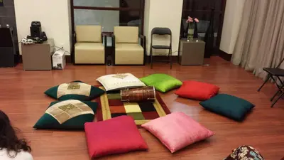 a group of pillows sitting on a wooden floor at 2 Bedroom 1 Bathroom Prime Location in Mississauga in Mississauga