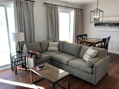 a living room with a couch and a table at Touchstone Resort in Bracebridge