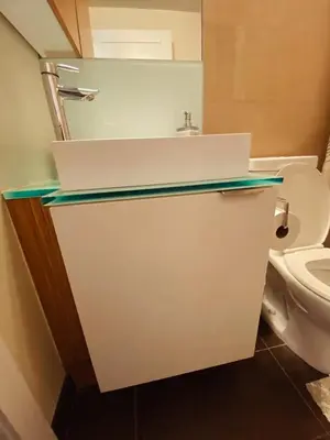 a bathroom with a sink and a toilet at Luxury condo on CN TOWER in Toronto
