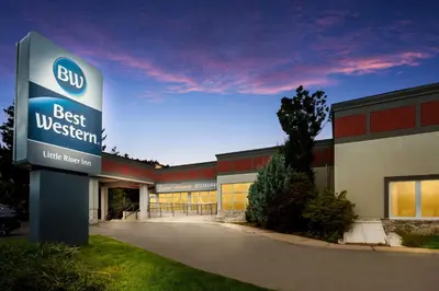 a building with a sign that reads best western at Best Western Little River Inn in Simcoe
