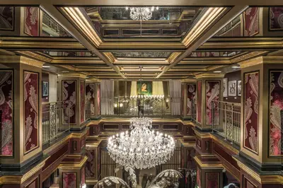 a large room with a chandelier in the middle at Windsor Arms Hotel in Toronto