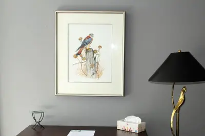 a picture of a bird on a wall with a lamp at Tailwinds B&B in Erin