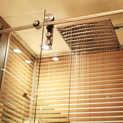 a bathroom with a window with blinds at Le Germain Hotel Maple Leaf Square in Toronto