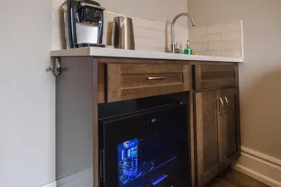 a kitchen with a dishwasher and a counter with a sink at Evanndor in Stratford