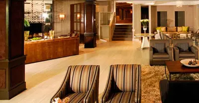 a lobby with couches and a living room at Hockley Valley Resort in Orangeville
