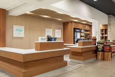 a lobby of a store with a cash register at Hilton Garden Inn Kitchener/Cambridge in Cambridge