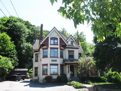 a house with a red and white at McBayne House in Hamilton