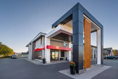 a rendering of a building in a parking lot at Comfort Inn in Hamilton