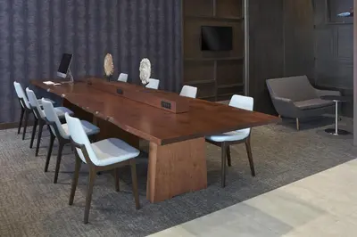 a large wooden table with white chairs in a room at Hyatt Place Toronto Mississauga and Luxe Convention Centre in Mississauga