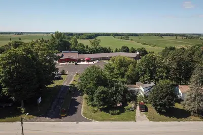 an overhead view of a building with a parking lot at King Hotel in Palmerston