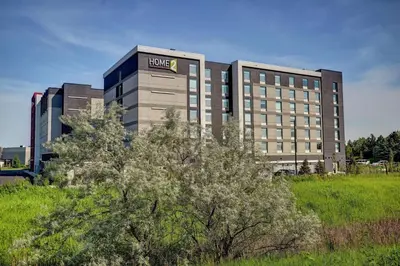 a large building with a hotel sign on it at Home2 Suites By Hilton Toronto/Brampton, On in Brampton