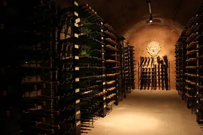 a wine cellar with rows of wine bottles at Inn On The Twenty in Jordan