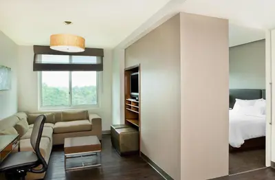 a living room with a bed and a couch at Element Vaughan Southwest in Vaughan