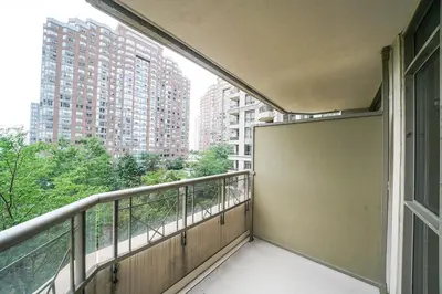 an empty balcony with a view of buildings at PlanURstay - Luxury Suites Mississauga Downtown in Mississauga