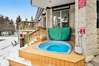 a jacuzzi tub in the middle of a building at Condo 212 at North Creek Resort by Vacasa in Blue Mountains