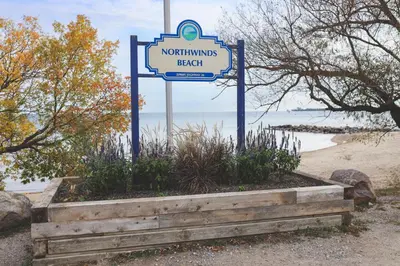 a sign for a northumsack beach on the beach at Wintergreen 223 in Blue Mountains