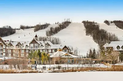 a resort in the snow with a ski slope at Condo 807 at North Creek Resort in Blue Mountains