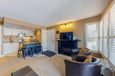 a living room with a couch and a table at Condo 505 at North Creek Resort in Blue Mountains